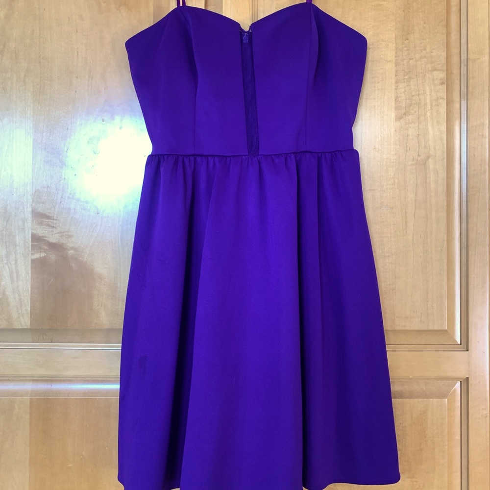 Strapless purple cocktail dress with mesh lining down front